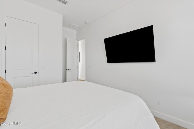 bedroom featuring baseboards