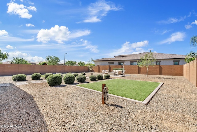 view of fenced backyard