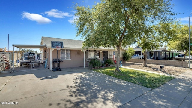 view of front of home featuring a carport