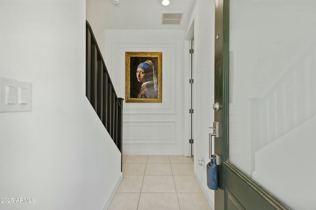 interior space featuring light tile patterned floors