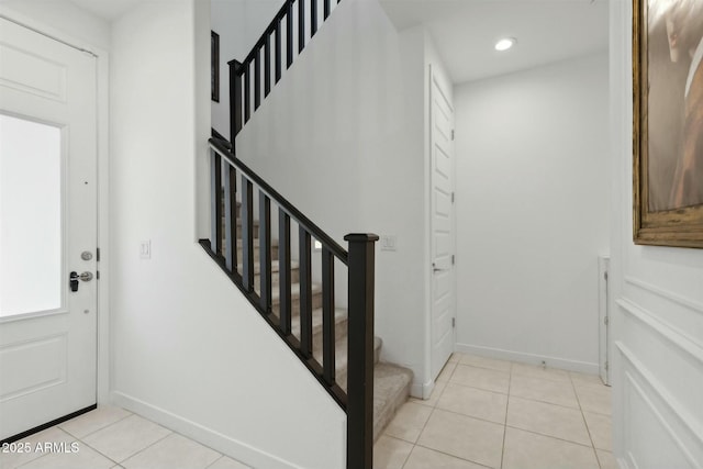 view of tiled foyer entrance