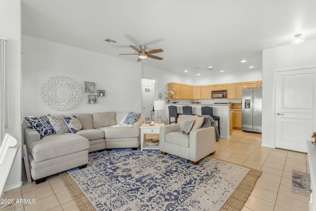 living area featuring recessed lighting, visible vents, ceiling fan, and light tile patterned flooring