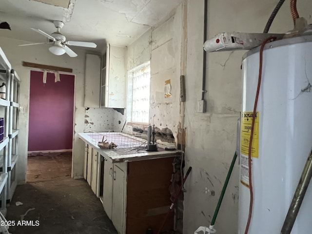 kitchen with ceiling fan and gas water heater