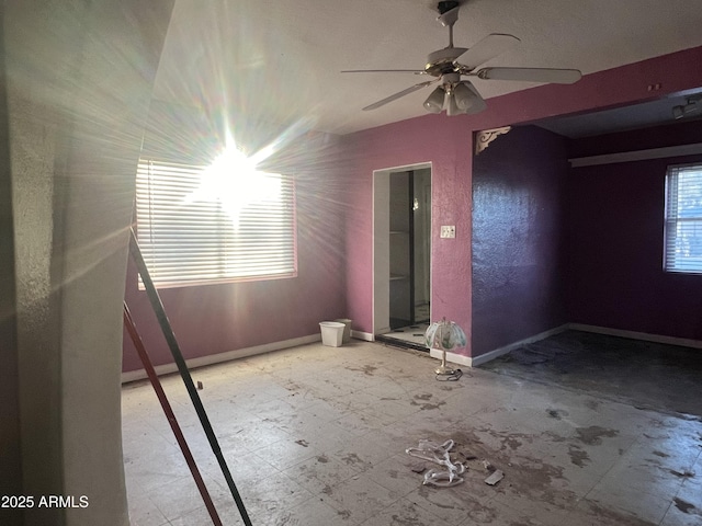 spare room featuring ceiling fan