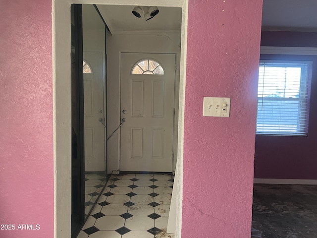 interior space with crown molding