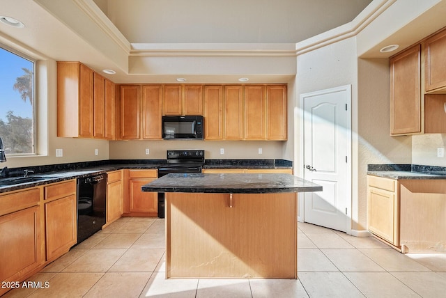 kitchen with a sink, a kitchen island, black appliances, and light tile patterned floors