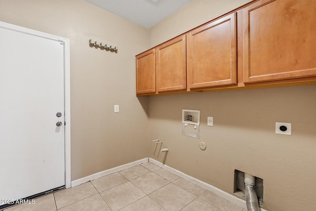 laundry room with washer hookup, light tile patterned floors, cabinet space, gas dryer hookup, and electric dryer hookup