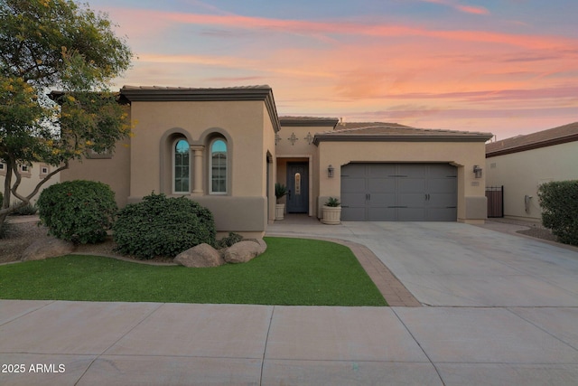 view of front of property featuring a garage