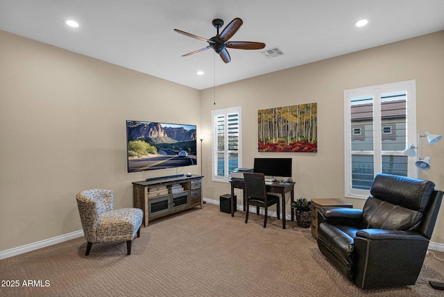 office space featuring ceiling fan and carpet floors