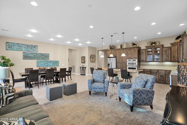 living room with light tile patterned floors