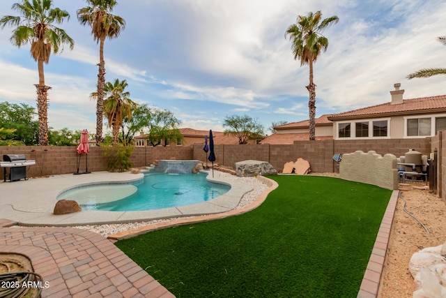 view of swimming pool featuring a patio, a fenced in pool, a fenced backyard, a lawn, and grilling area