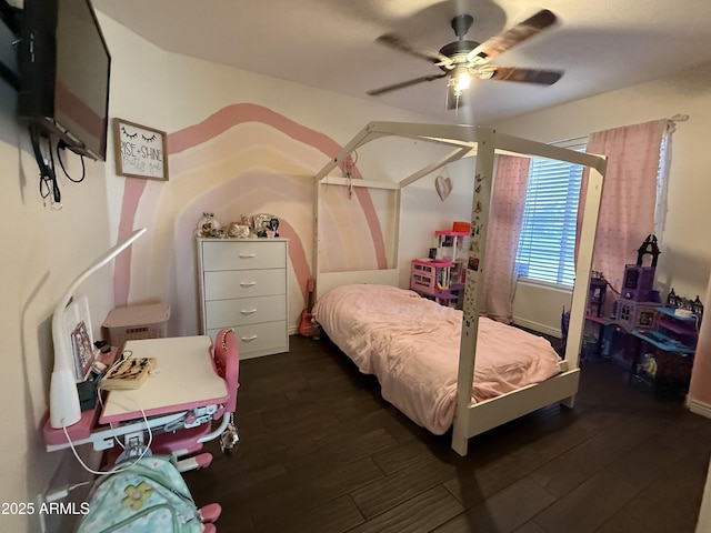 bedroom with dark wood-type flooring and ceiling fan