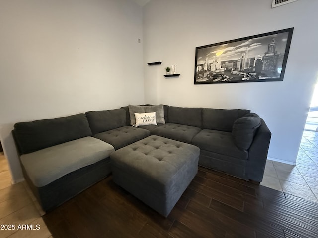 living room with dark wood-style flooring