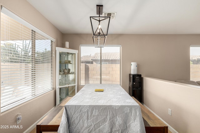 dining room featuring a notable chandelier