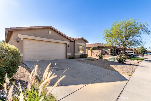 ranch-style house featuring a garage