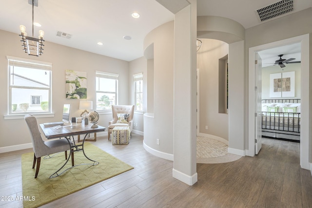 dining room featuring recessed lighting, visible vents, and wood finished floors