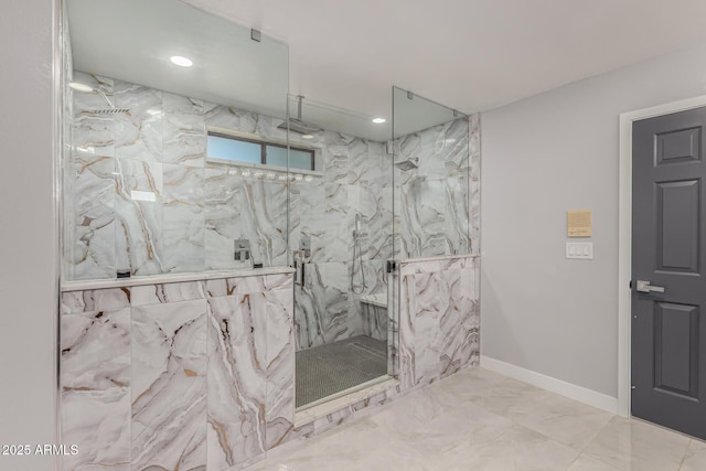 bathroom with a tile shower