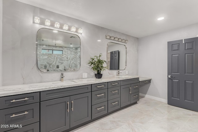 bathroom with a shower and vanity