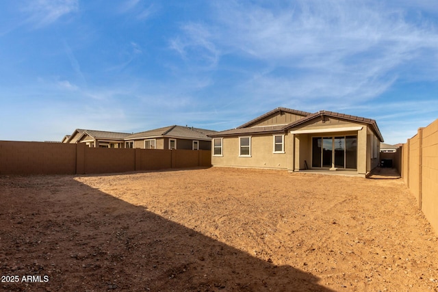 rear view of property with a patio