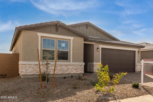 view of front of property featuring a garage