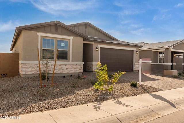 view of front of property featuring a garage