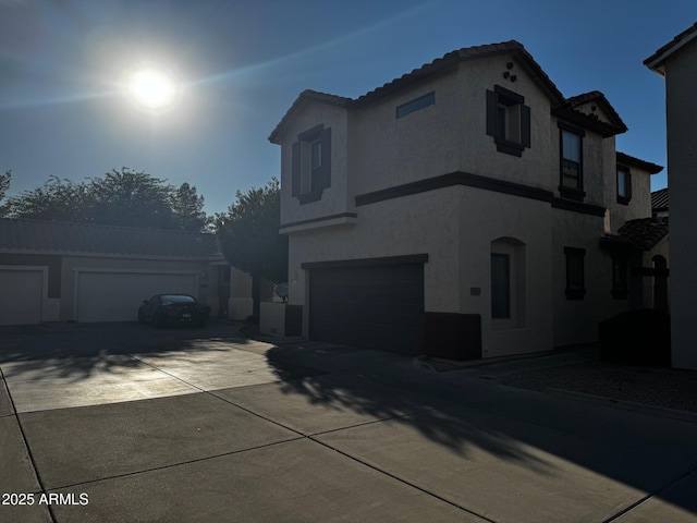 876 S Colonial Dr, Gilbert, AZ 85296 - view of front of property with stucco siding, concrete driveway, and a tiled roof