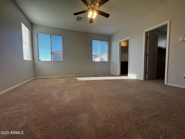 876 S Colonial Dr, Gilbert, AZ 85296 - unfurnished bedroom featuring carpet floors, a spacious closet, ceiling fan, and ensuite bath