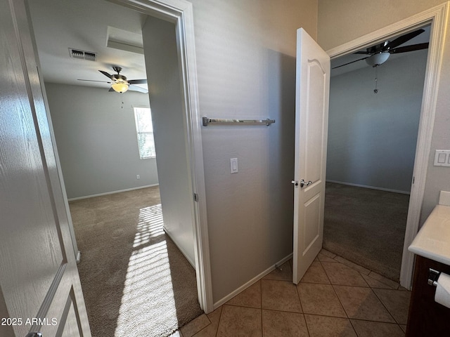 876 S Colonial Dr, Gilbert, AZ 85296 - hallway featuring carpet flooring and tile patterned flooring