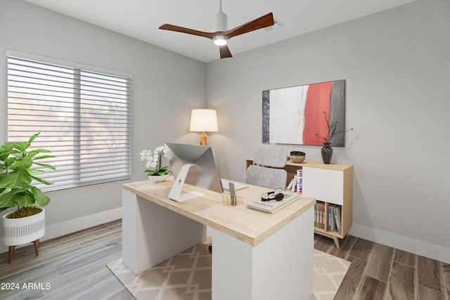 office space featuring ceiling fan and wood-type flooring