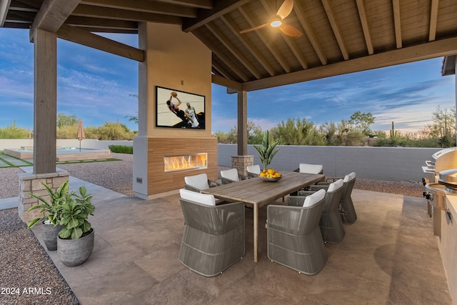 view of patio / terrace featuring grilling area and ceiling fan