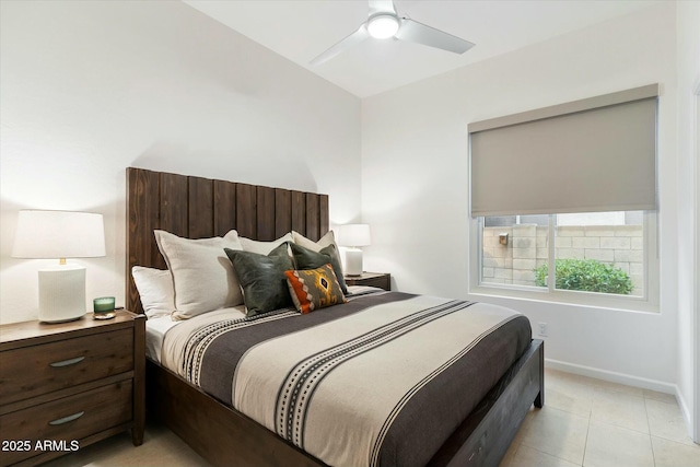 bedroom with light tile patterned floors, baseboards, and ceiling fan