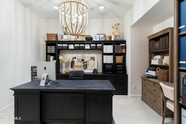 office space with light tile patterned flooring and baseboards