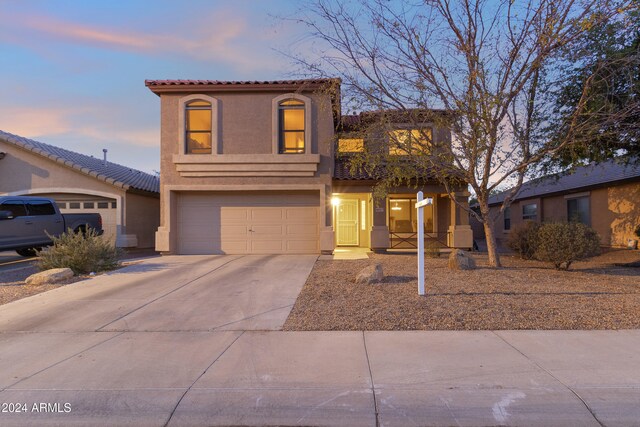 view of front of home with a garage