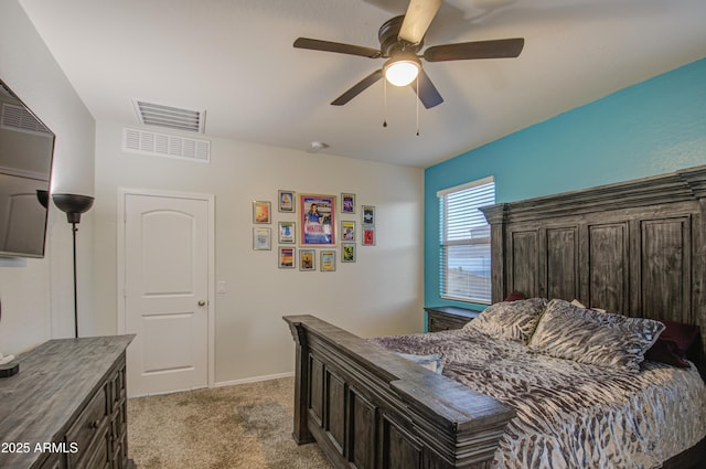 bedroom featuring light carpet, visible vents, and a ceiling fan