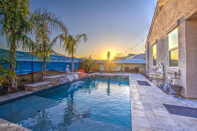 view of pool featuring a patio and a fenced in pool