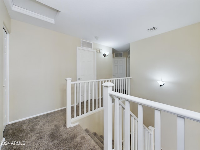 hall with carpet floors