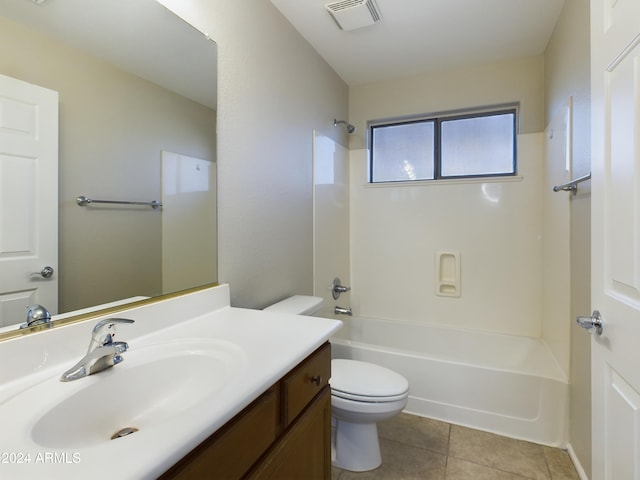 full bathroom with tile patterned floors, vanity, shower / tub combination, and toilet