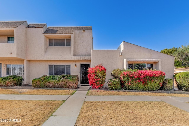 exterior space featuring stucco siding