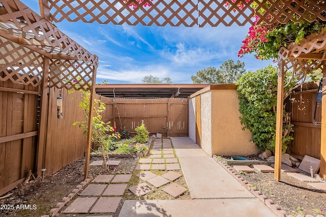 2233 W Farmdale Ave Unit 2, Mesa, AZ 85202 - view of patio featuring a fenced backyard