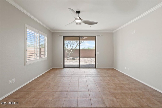 tiled spare room with ceiling fan, a wealth of natural light, and ornamental molding