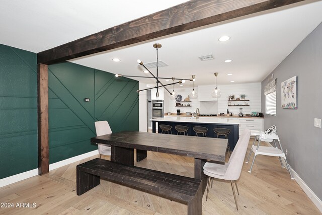 dining area with light hardwood / wood-style flooring