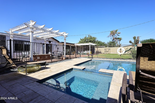 view of pool featuring an in ground hot tub, a pergola, and a patio