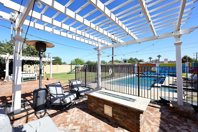 view of patio featuring a playground, a fire pit, a fenced in pool, and a pergola