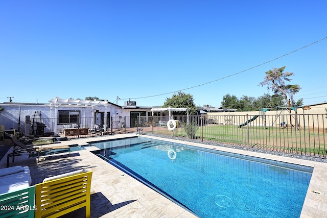 view of pool featuring a patio area