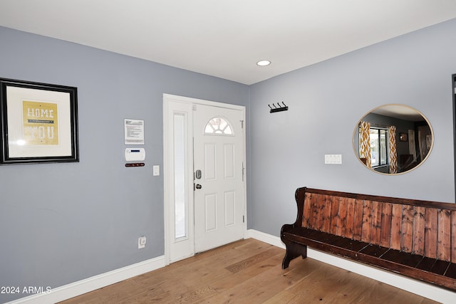 foyer entrance with light hardwood / wood-style floors