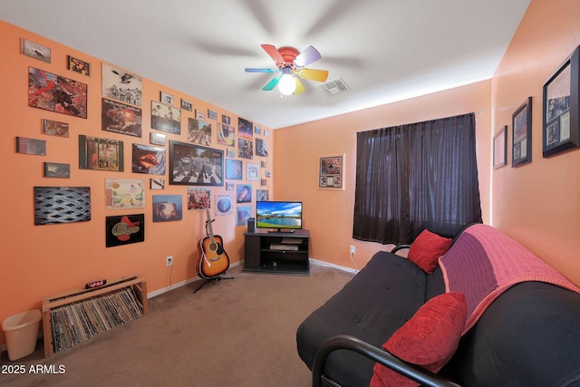 interior space featuring carpet floors and ceiling fan