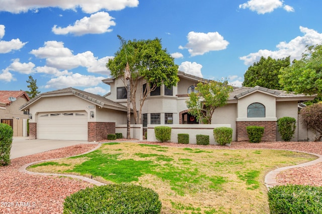 view of front of house with a garage and a front yard