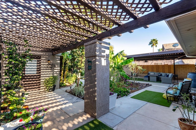 view of patio / terrace with a pergola, outdoor lounge area, and fence