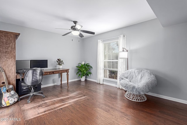 office featuring ceiling fan, baseboards, and wood finished floors