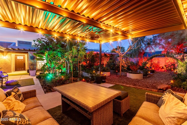 view of patio featuring outdoor lounge area and a fenced backyard